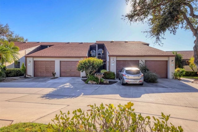 single story home featuring a garage