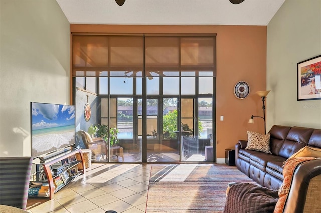 4542 Park Lake Ter N Unit 4542, Bradenton, FL 34209 - tiled living room featuring a high ceiling and a ceiling fan
