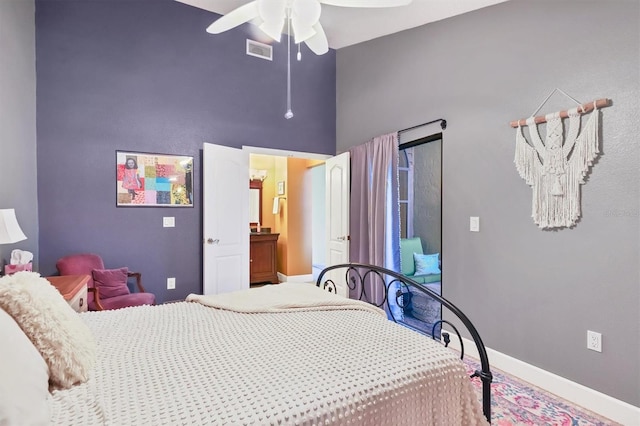 4542 Park Lake Ter N Unit 4542, Bradenton, FL 34209 - bedroom with a high ceiling, baseboards, and a ceiling fan
