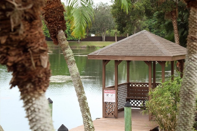 view of home's community featuring a gazebo and a water view