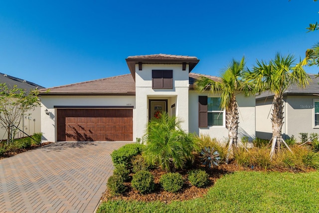 view of front of home with a garage