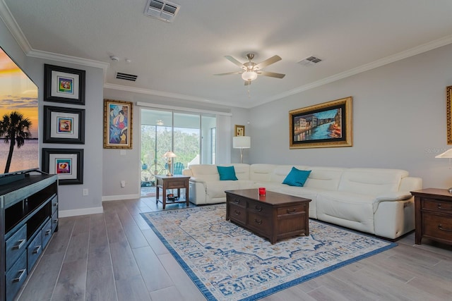 16819 Shell Bay Dr, Land O Lakes, FL 34638 - living room with a ceiling fan, ornamental molding, dark wood-style floors, and baseboards