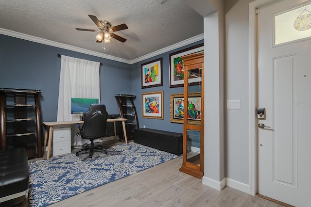 16819 Shell Bay Dr, Land O Lakes, FL 34638 - office featuring wood finished floors, a textured ceiling, ceiling fan, ornamental molding, and baseboards