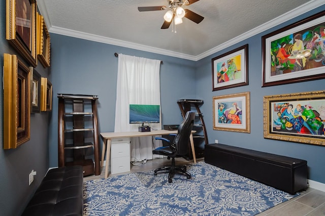16819 Shell Bay Dr, Land O Lakes, FL 34638 - office area with ceiling fan, crown molding, a textured ceiling, and baseboards