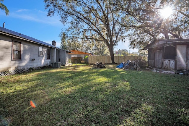 view of yard featuring central AC unit