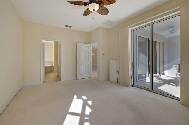 unfurnished bedroom with access to outside, ensuite bath, ceiling fan, and light colored carpet