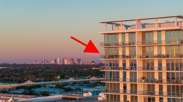 view of outdoor building at dusk