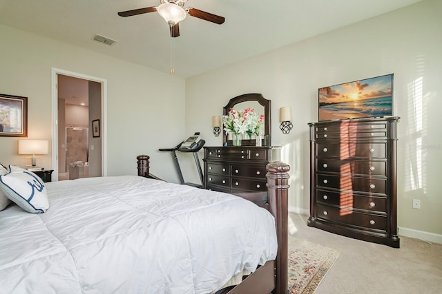 carpeted bedroom featuring ceiling fan and connected bathroom