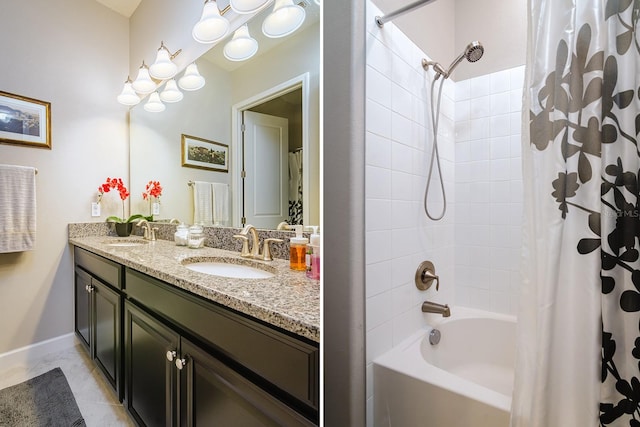 bathroom featuring vanity and shower / bath combo with shower curtain