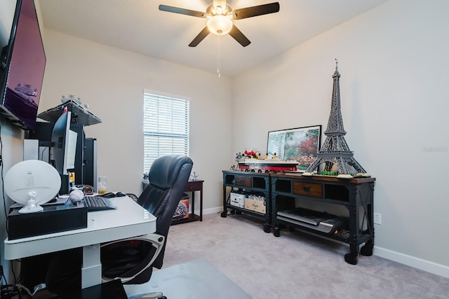 carpeted office with ceiling fan