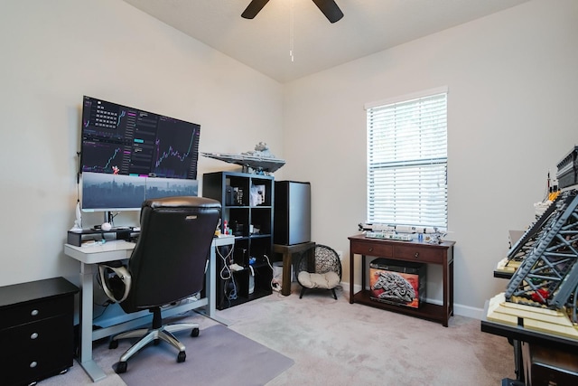 carpeted home office with ceiling fan