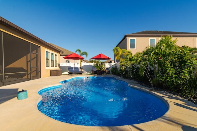 view of pool featuring a patio