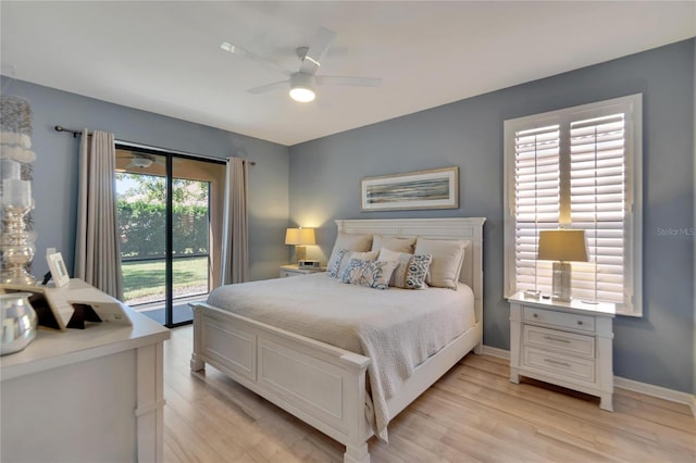 bedroom featuring access to exterior, ceiling fan, and light hardwood / wood-style floors