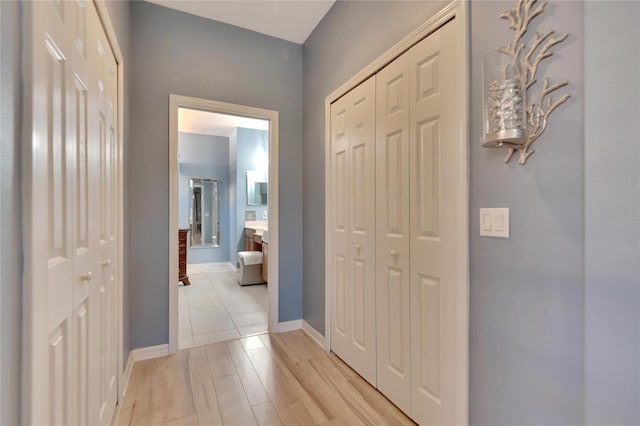 hall featuring light wood-type flooring