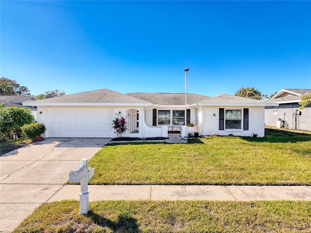 ranch-style house with a garage and a front yard