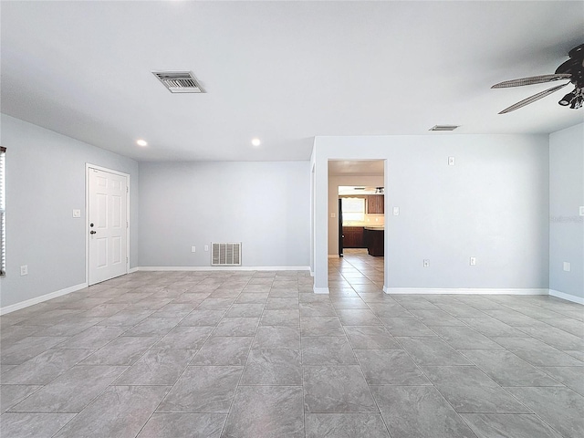 empty room featuring ceiling fan