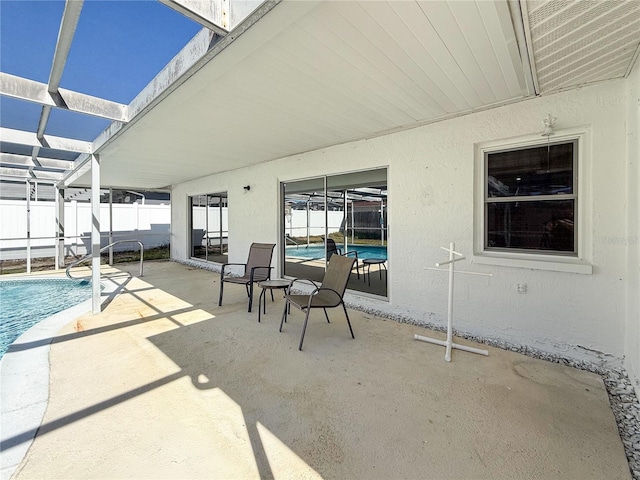 view of patio / terrace featuring a fenced in pool