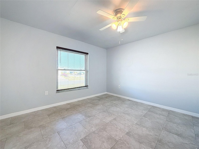 unfurnished room with ceiling fan