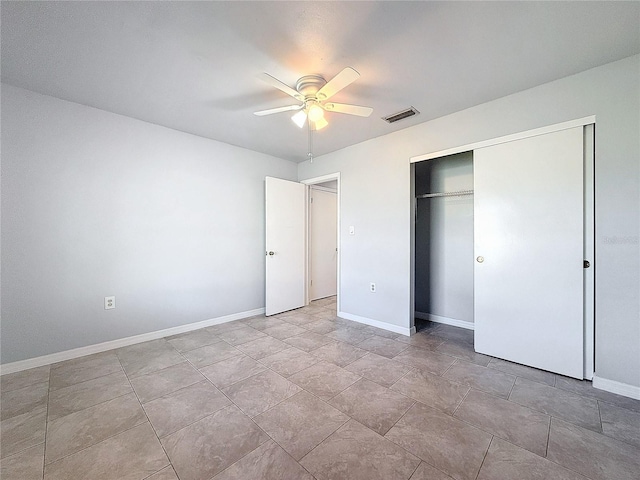 unfurnished bedroom with a closet and ceiling fan