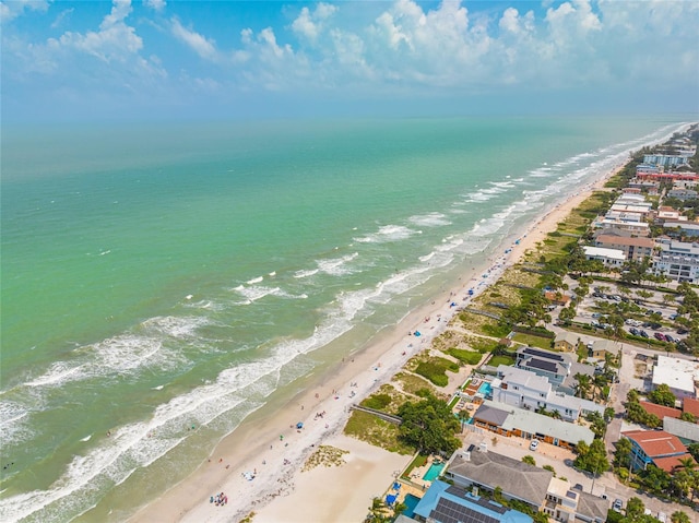 aerial view featuring a water view and a beach view