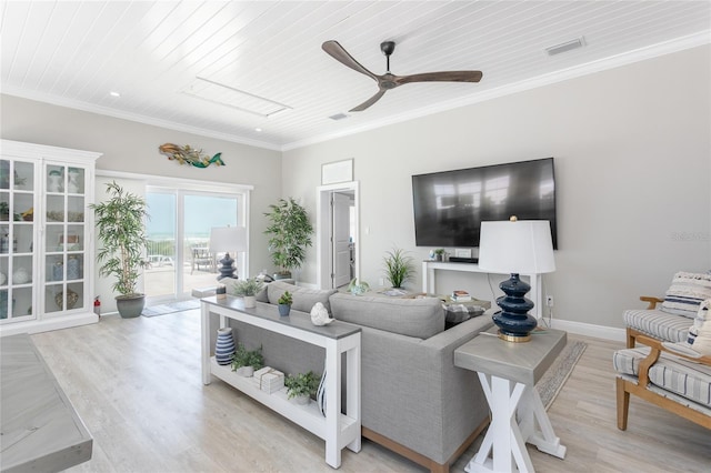 living room featuring ornamental molding, light wood-type flooring, and wooden ceiling