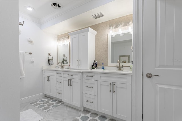 bathroom featuring vanity and crown molding