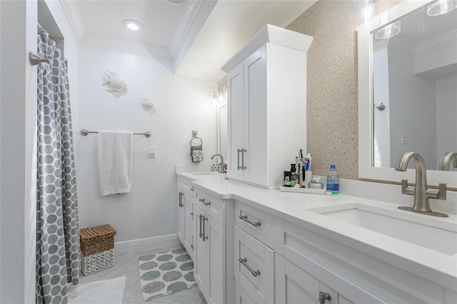 bathroom with vanity and crown molding