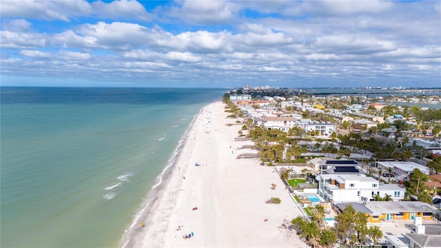 bird's eye view with a view of the beach and a water view