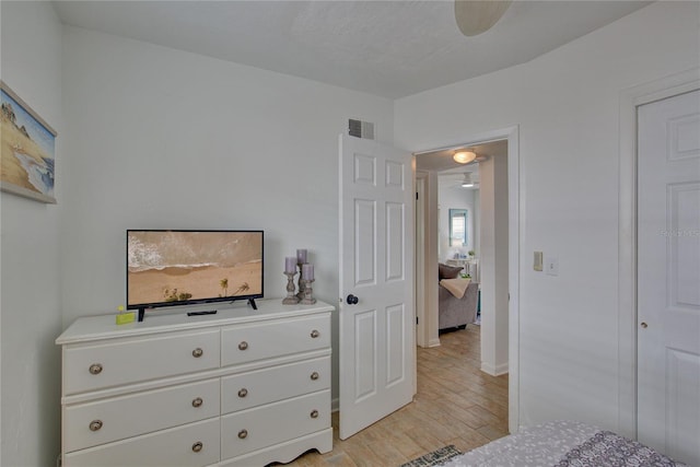 bedroom with light hardwood / wood-style floors