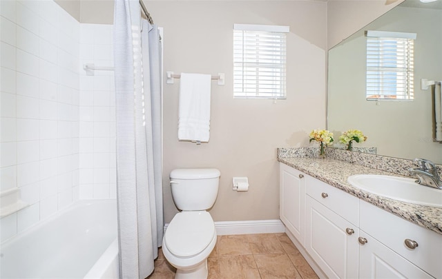 full bathroom featuring tile patterned flooring, shower / tub combo, vanity, and toilet