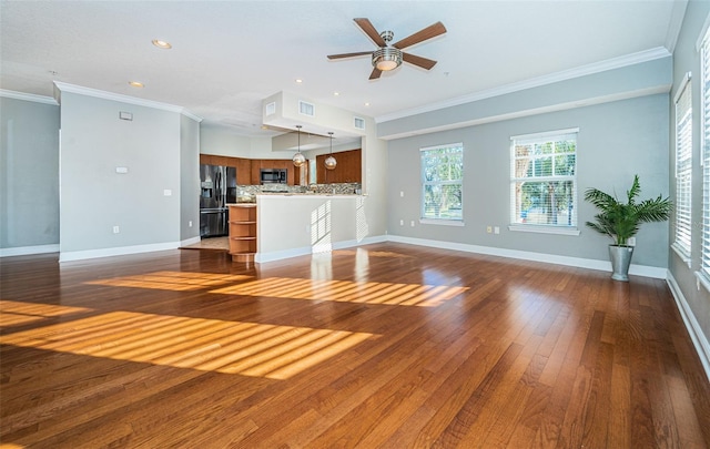 unfurnished living room featuring dark hardwood / wood-style floors, ceiling fan, and ornamental molding