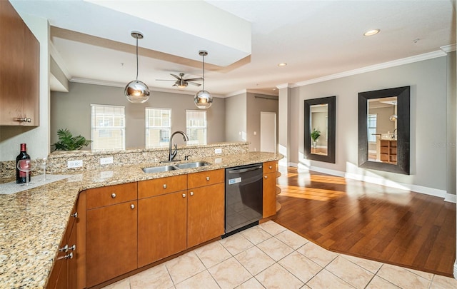 kitchen featuring kitchen peninsula, sink, light hardwood / wood-style floors, and black dishwasher