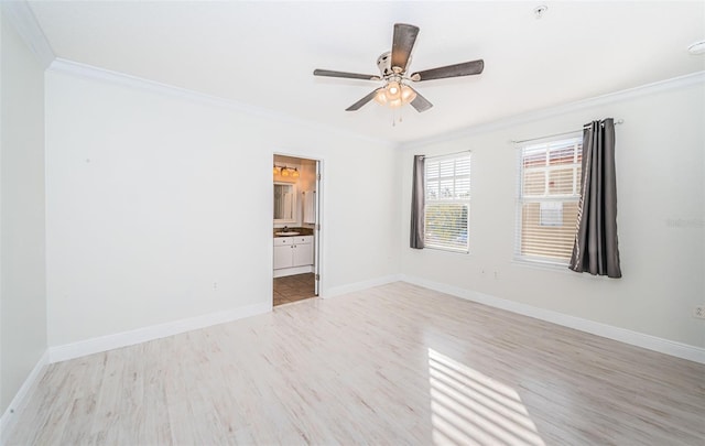 unfurnished room featuring crown molding, ceiling fan, and light wood-type flooring