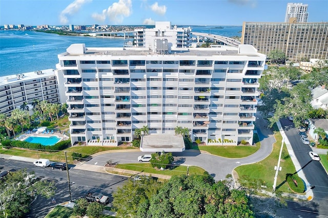 birds eye view of property with a water view