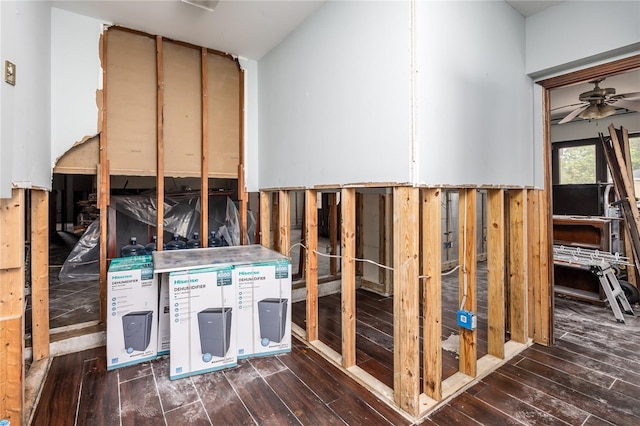 miscellaneous room featuring ceiling fan and dark hardwood / wood-style floors