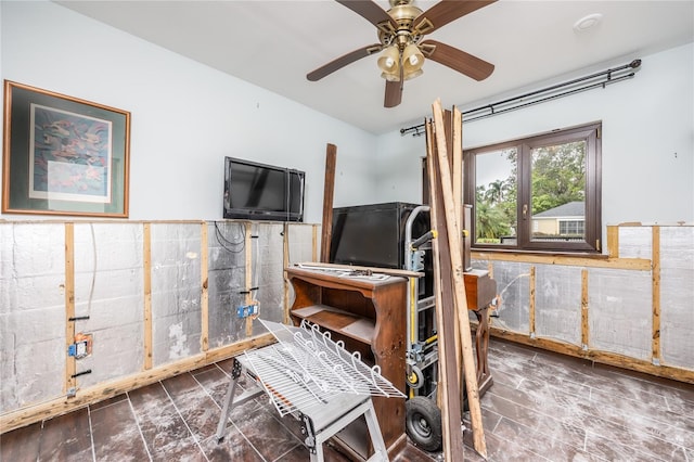 interior space featuring ceiling fan and french doors