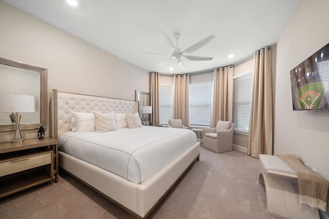 carpeted bedroom featuring ceiling fan