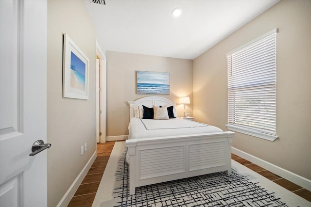 bedroom with tile patterned flooring