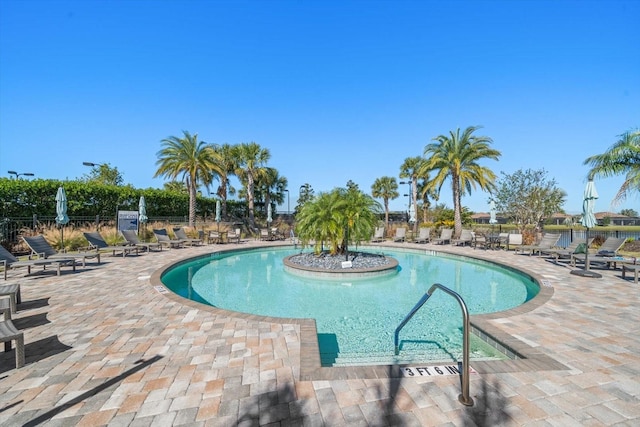 view of swimming pool featuring a patio