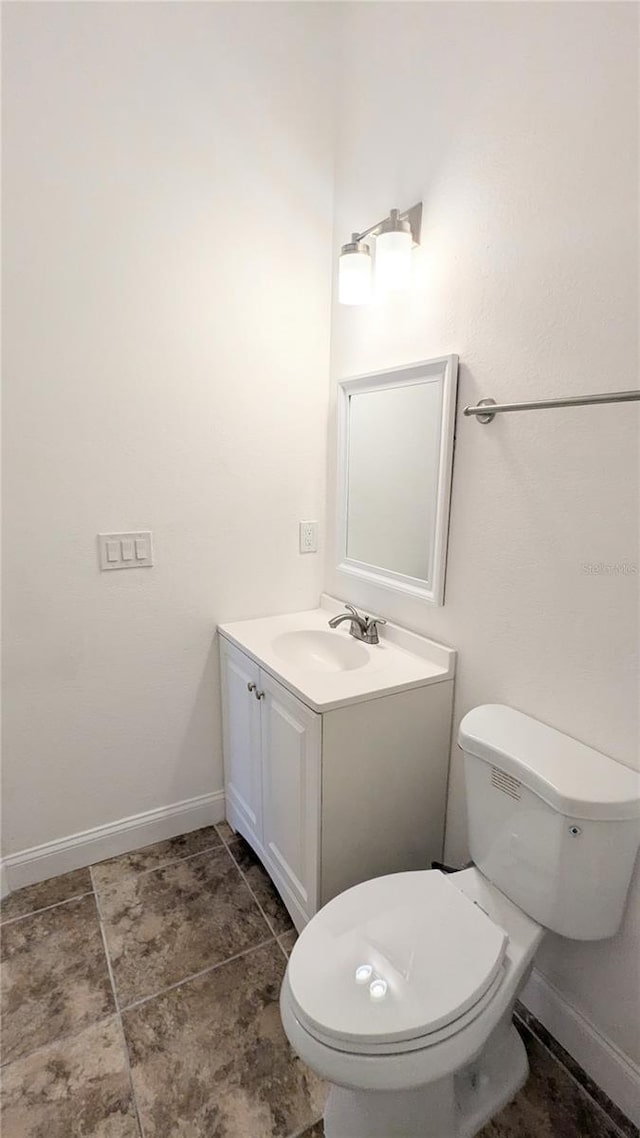 9060 Moonlit Meadows Loop, Riverview, FL 33578 - bathroom with vanity, toilet, baseboards, and tile patterned flooring