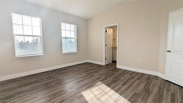 9060 Moonlit Meadows Loop, Riverview, FL 33578 - unfurnished bedroom featuring dark wood-style flooring, baseboards, and lofted ceiling