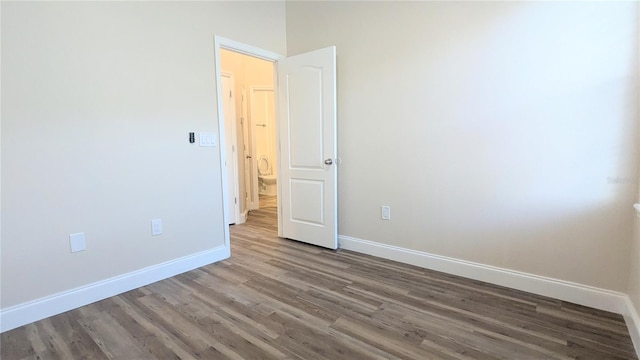 9060 Moonlit Meadows Loop, Riverview, FL 33578 - empty room with wood finished floors and baseboards