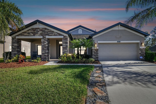 8144 Sequester Loop, Land O Lakes, FL 34637 - view of front of home with stone siding, a front lawn, stucco siding, and concrete driveway