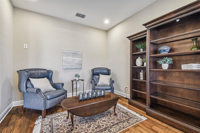 8144 Sequester Loop, Land O Lakes, FL 34637 - sitting room with baseboards, wood finished floors, and recessed lighting