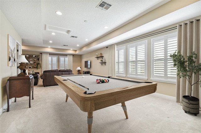 rec room with light carpet, a textured ceiling, and billiards