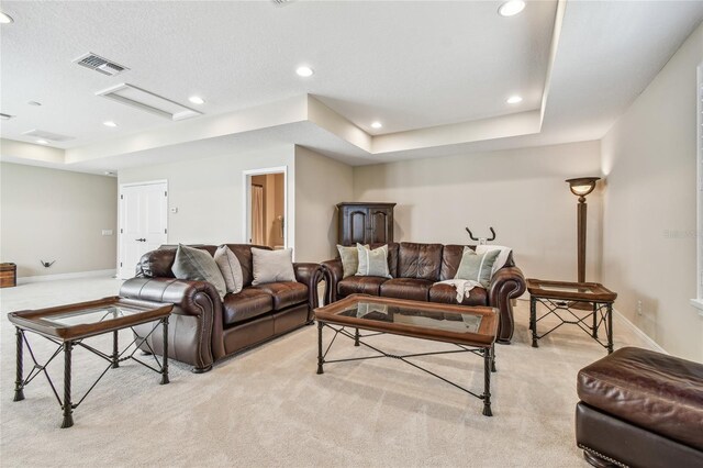 8144 Sequester Loop, Land O Lakes, FL 34637 - living area with light colored carpet, a raised ceiling, baseboards, and recessed lighting