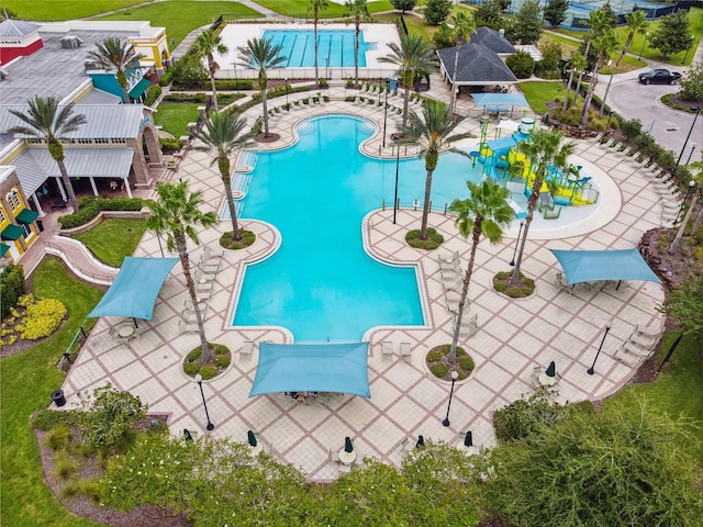 8144 Sequester Loop, Land O Lakes, FL 34637 - community pool featuring a water play area