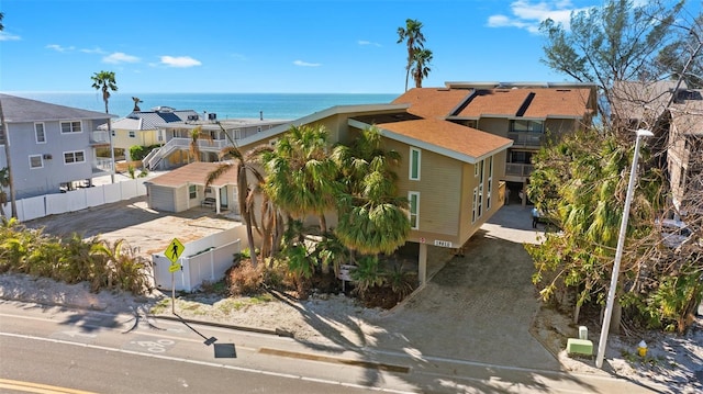 drone / aerial view featuring a water view