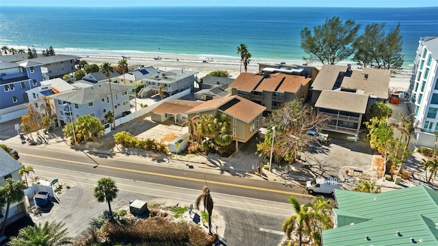 bird's eye view with a view of the beach and a water view