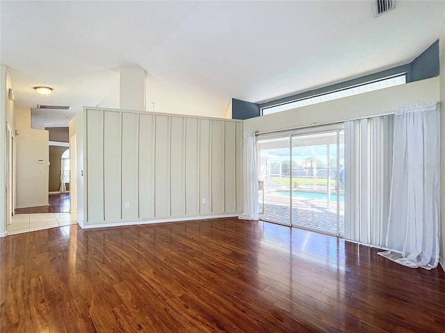 empty room featuring wood-type flooring